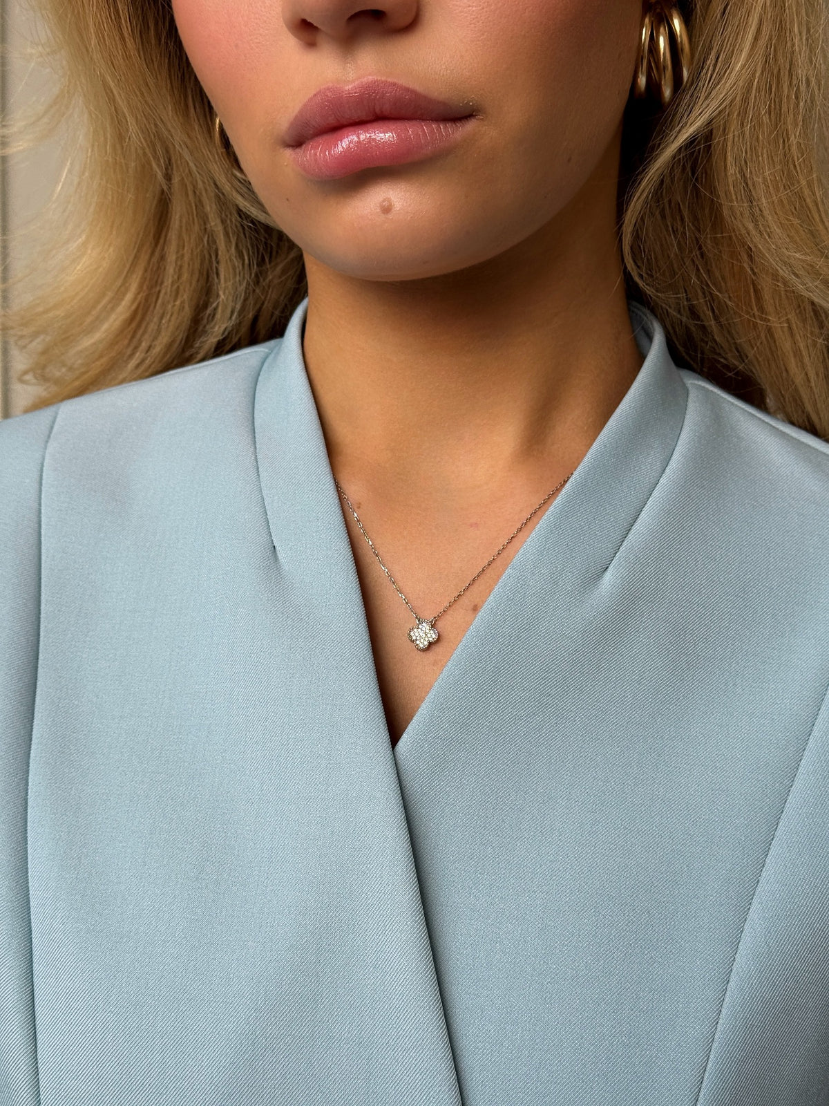 Powder blue wrap top — neckline detail